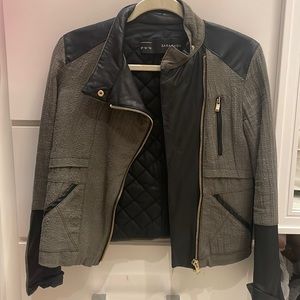 Zara jacket. Black leather and olive green. Gold zippers.